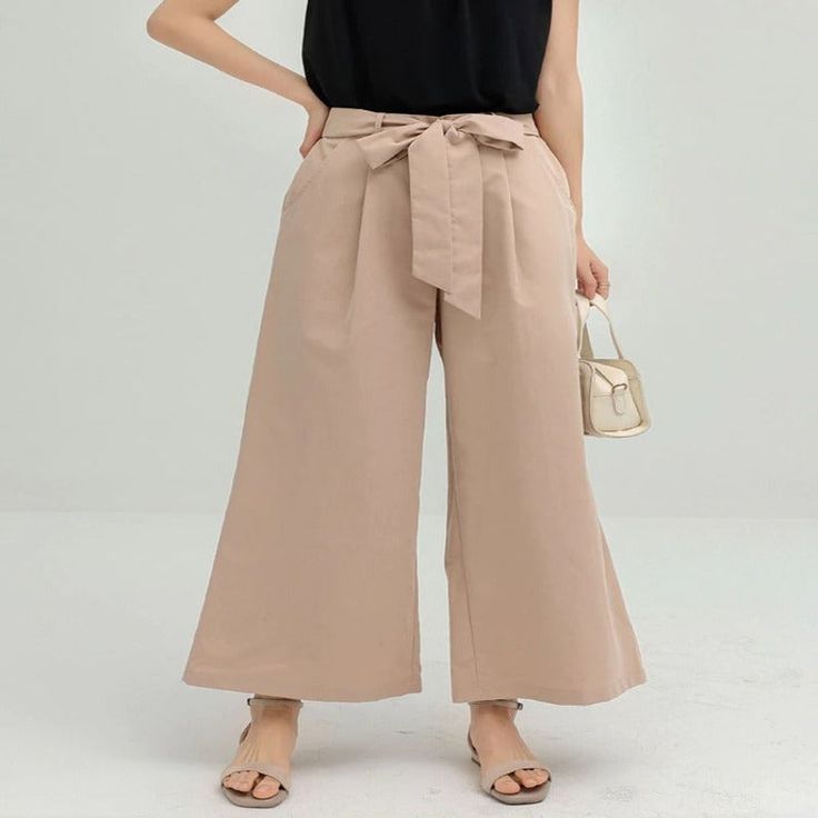 Loose Summer Pants For Women are best for summertime. When your skin perspires a lot in the heat and you feel uneasy, we have brought the best option for you to beat the heat in style with our loose pants. With these loose pants, you can walk freely without any discomfort. It comes in various colors to suit your style and mood. Specifications: Pant Style: Wide Leg Pants Material: Cotton, Polyester Fit Type: Loose Length: Ankle-Length Pants Decoration: Bow, Belt Season: Summer Fabric Type: Knitte Summer Wide Leg Culottes, Trendy Wide Leg Pants With Pockets For Beach, Trendy Beach Pants, Cotton Wide Leg Harem Pants For Day Out, Trendy Wide Leg Summer Culottes, Wide Leg Cotton Pants For Day Out, Summer Wide-leg Workwear Pants, Summer High-waisted Pants For Work, Summer Straight Pants For Workwear