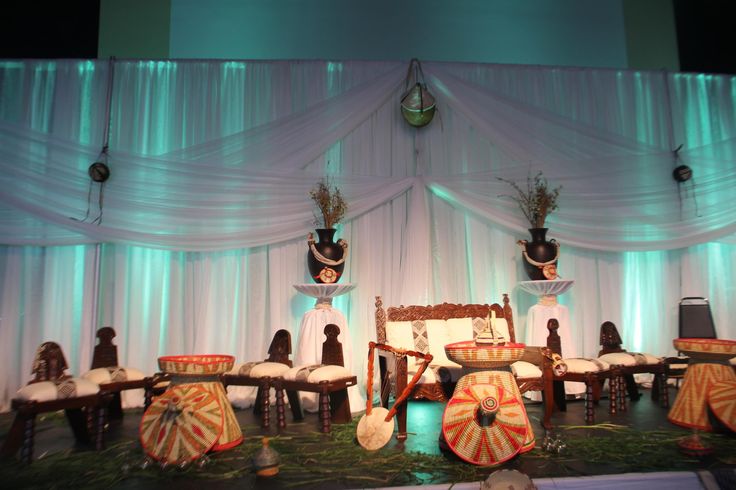 an image of a stage set up with chairs and decorations for a party or event