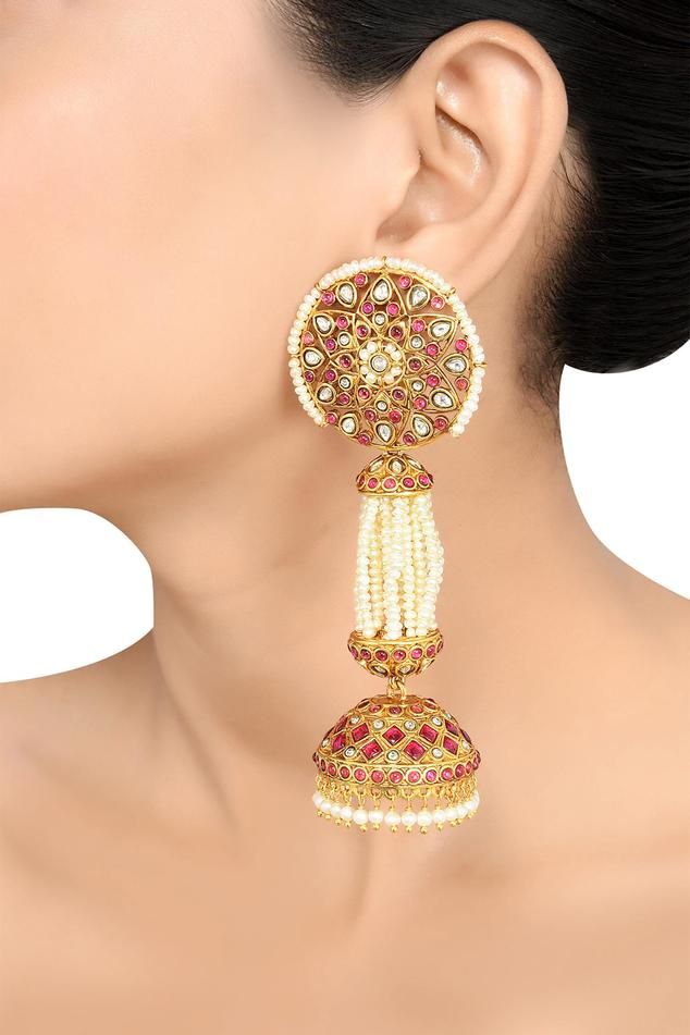 Gold plated jhumkas with pearls, crystals, coloured glass embellishments and floral pattern.
Type: Embellished
Composition: Alloy
Color: Gold, Pink, White
Other Details: 
Handcrafted
Dimensions L x W (in cms): 11 x 4
Weight (in gms): 76
Disclaimer: The jewellery is handcrafted and therefore variations may occur - Aza Fashions Festive Designer Earrings With Cutdana, Festive Cutdana Earrings For Designer Wear, Diwali Designer Jewelry With Latkans, Fusion Kundan Jhumkas With Stone Work, Fusion Style Kundan Jhumkas With Stone Work, Designer Meenakari Fusion Earrings, Designer Chandbali Earrings With Latkans, Designer Fusion Meenakari Earrings, Fusion Style Festive Jhumkas With Stone Work