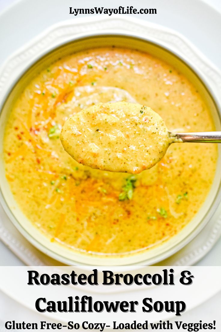 broccoli and cauliflower soup in a white bowl with a spoon