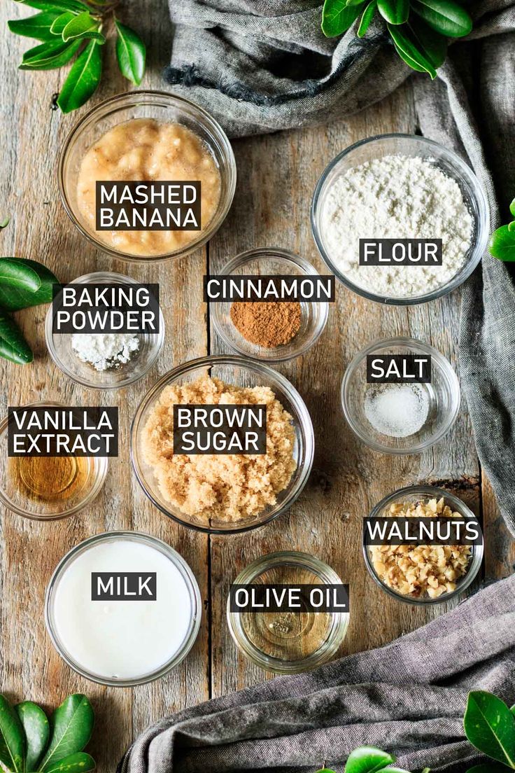 the ingredients to make an oatmeal smoothie laid out on a wooden table