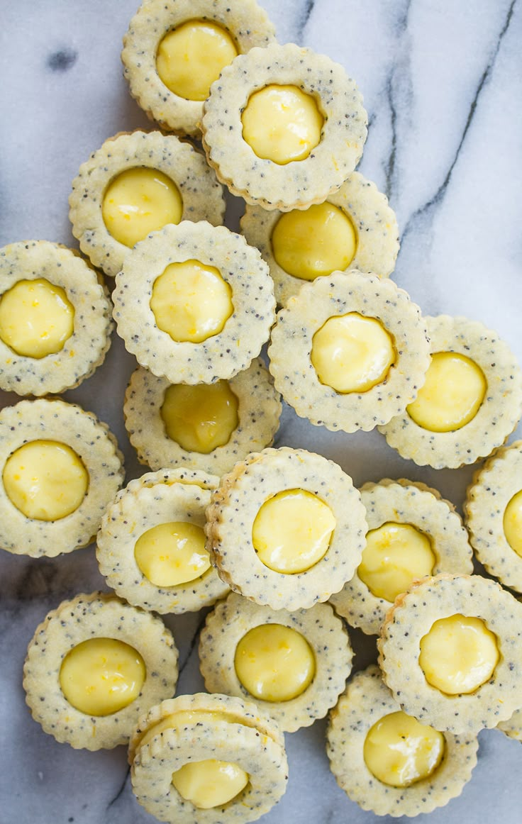 small crackers with lemon filling on a marble surface