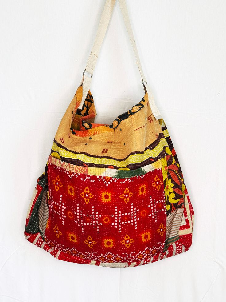 Voluminous enough to hold all your necessities our vintage Kantha Beach Bazaar Bag is the perfect companion for a day at the beach, strolling through the farmer’s market, sleepovers and of course, travel. Twisted Guru Bazaar Bags come in a wide variety of prints and patterns making accessorizing your outfit easy and fun! Product Details: Handcrafted One-of-a-Kind Multi Patterns. Two-(2) handbags are cut from the same cloth. They are similar but different, so please note that your handbag may be Bike Bags, Forever Green, Prints And Patterns, Blue Poppy, The Farmer, Multi Pattern, Bike Bag, Vintage Kantha, Diy Stuff