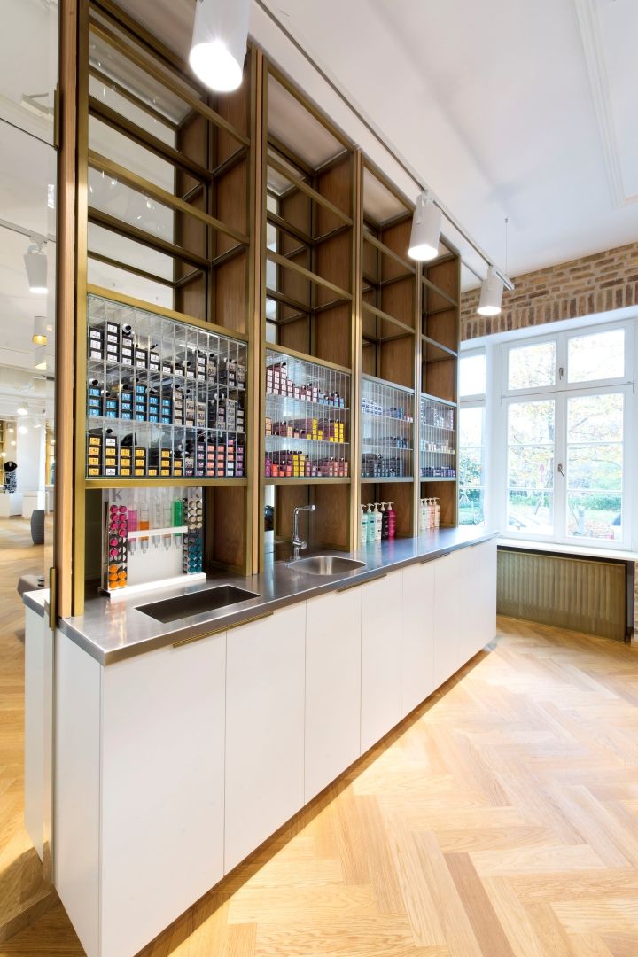 an empty store with lots of bottles on the shelves