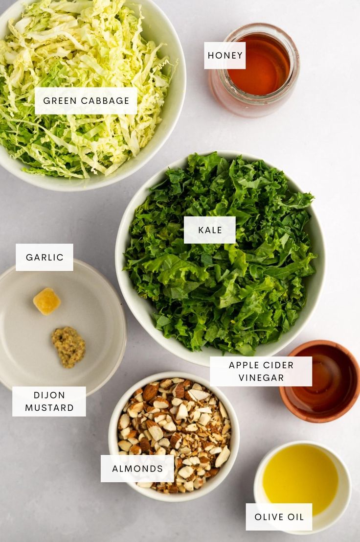 the ingredients to make this salad are shown in bowls and labeled with their corresponding names