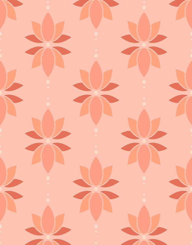 an orange and pink flower pattern on a light pink background with circles in the center