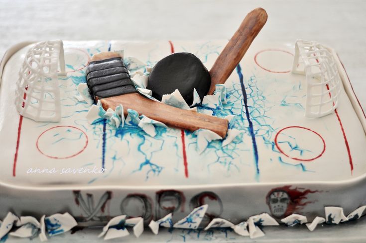 a cake that looks like an ice hockey rink