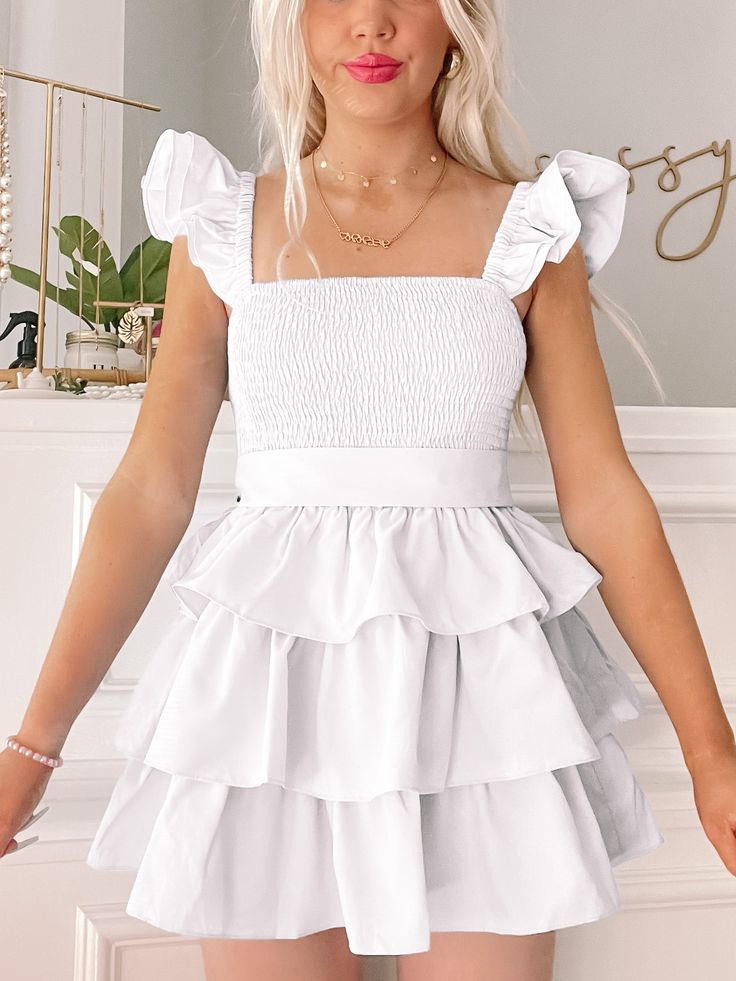 Sweet Sorbet White Ruffle Dress | Sassy Shortcake | sassyshortcake.com Cute Sleeveless Tiered Ruffle Dress, Cute Sleeveless Tiered Dress With Ruffles, Cute Mini Dress With Ruffled Straps, Cute Mini Dress With Ruffled Straps And Ruffles, Cute Tiered Ruffle Mini Dress, Cute Tiered Skirt Mini Dress With Ruffles, Cute Tiered Mini Dress With Ruffles, White Tiered Dress With Layered Hem, Fitted Tiered Dress With Ruffled Straps For Brunch