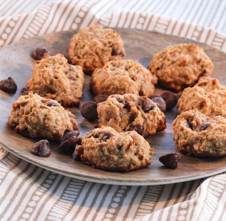 chocolate chip cookies on a wooden plate