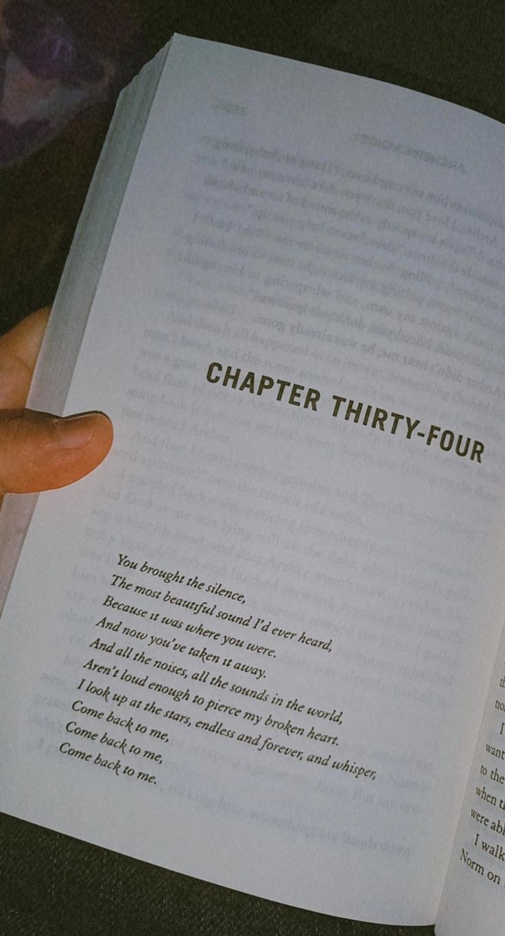 a person holding an open book with the title'chapter thirty - four'written on it