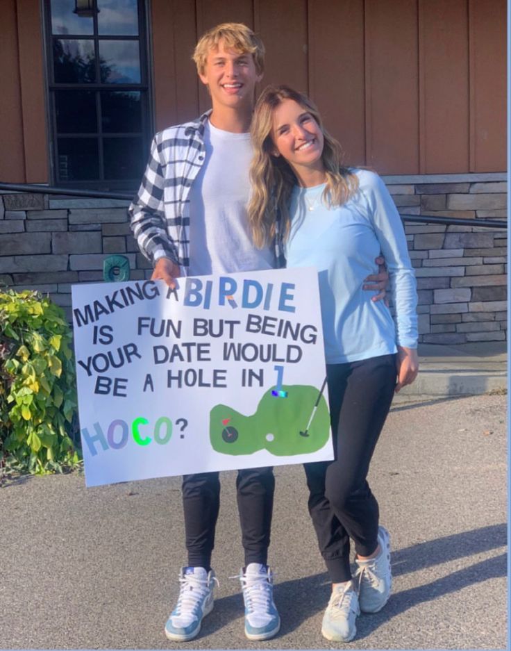 two people holding a sign that says, making a birdie is fun but being your date would be a hole in hoo?