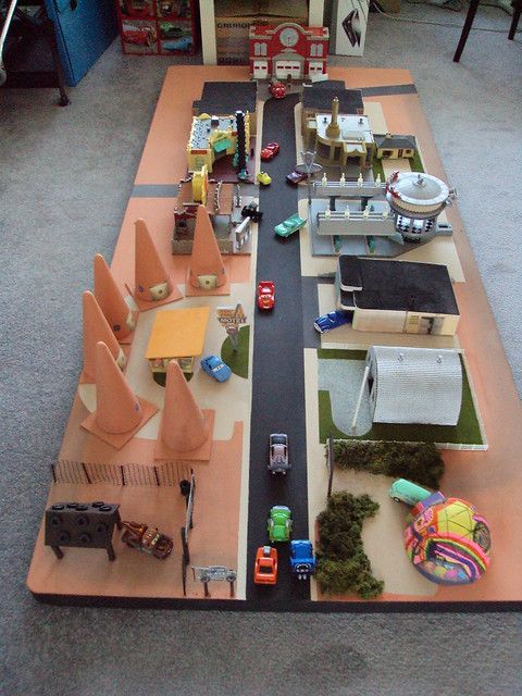 a toy train set is shown on the floor