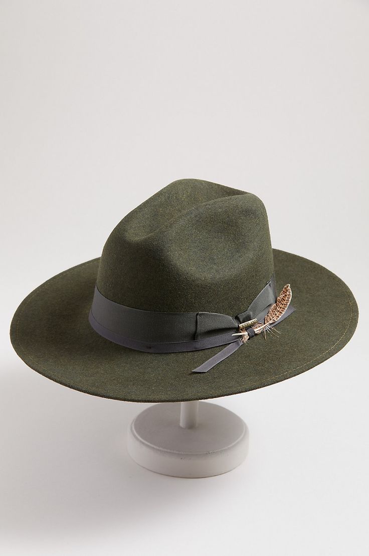 With our Quest, you no longer need to worry about traveling with your favorite hat. This cool classic returns to its original, 4.5" pinched-crown shape when unpacked. Atop the 3.25" brim, a single feather gives the tonal grosgrain ribbon trim a unique flair. Fedora Hat Style, Fedora Hats, Felt Fedora, Cherry On Top, Felt Hat, Ribbon Trim, Hat Band, Fedora Hat, Grosgrain Ribbon