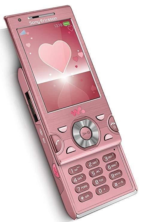 a pink cell phone with a heart on the screen