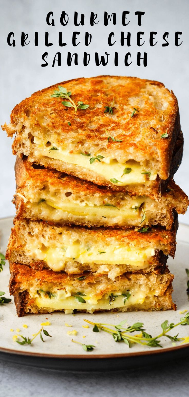 three grilled cheese sandwiches stacked on top of each other with the words gourmet grilled cheese sandwich