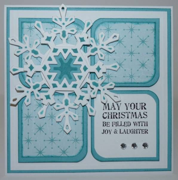 a card with snowflakes on it that says, may your christmas be filled with joy and laughter