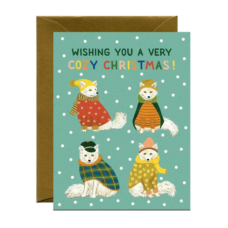 a christmas card with three cats wearing sweaters and hats, on a blue background