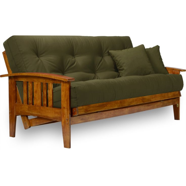 a wooden futon couch with green cushions on it's back and armrests