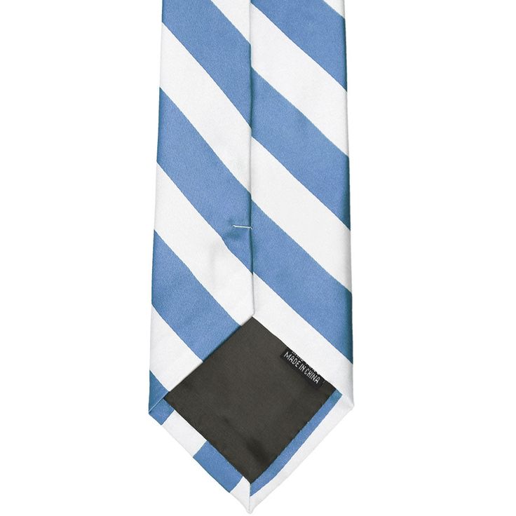 Need a tie you can wear again and again to the office? This is the one! The softened cornflower blue shade is easy to match to slacks and button down shirts. This one is great for weddings, too. For more formal occasions, pair it with a navy blue suit and a cornflower solid color pocket square (sold separately). This is a regular length and width men's necktie, measuring 3.5-inches wide and 57-inches long. The tie has a smooth finish and a heavyweight feel. The material is finished with an elega Light Blue Accessories For Black Tie Event, Professional Blue Suit And Tie Accessories For Work, Classic Blue Suit And Tie Accessories For Work, Classic Blue Suit And Tie Accessories For Office, Blue Professional Suit And Tie Accessories For Workwear, Classic Blue Suit And Tie Accessories For Summer, Classic Summer Suit And Tie Accessories For Office, Classic Suit And Tie Accessories For Summer Office, Elegant Light Blue Tie For Formal Occasions