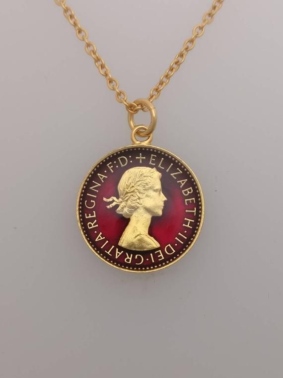 1956 Wren Farthing NecklaceA genuine coin has been used, 1956 was the last year that the Farthings were minted which means they are scarcer.The coin has been polished and gold plated.It has then been hand enamelled on both sides in red. Diameter: 20.2mmChain is 18" and gold plated The pendant comes in a presentation box with a certificate of authentication. Vintage Charm Pendant Coin Necklace, Vintage Pendant Coin Necklace With Charm, Antique Coin Necklace For Anniversary, Antique Coin Necklaces For Anniversary, Vintage Collectible Coin Pendant Jewelry, Collectible Vintage Jewelry With Coin Pendant, Vintage Collectible Jewelry With Coin Pendant, Vintage Jewelry With Coin Pendant For Collectors, Vintage Coin Necklace For Formal Occasions