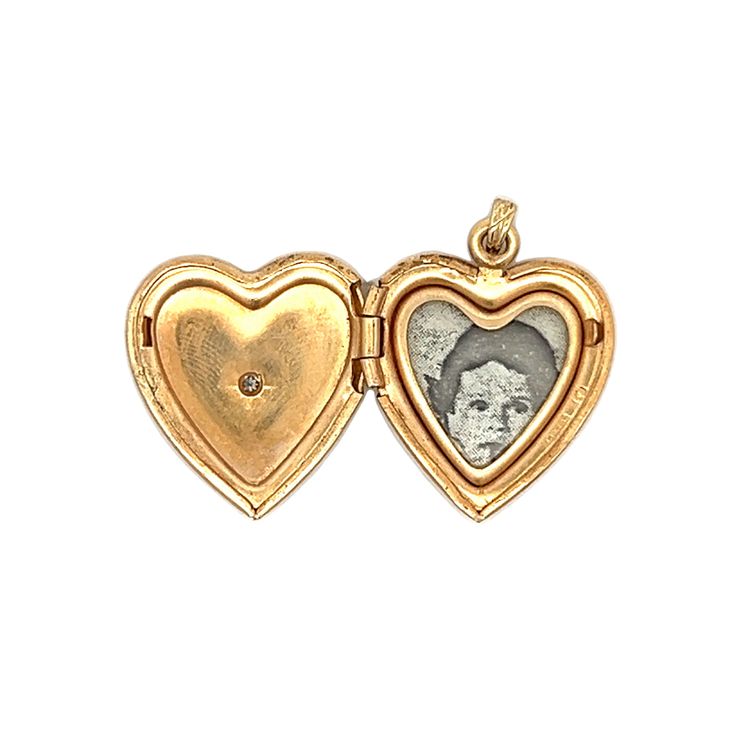 Relive the charm of the Victorian era with this heart-shaped locket pendant. Crafted from 14 karat yellow gold, this antique locket opens to hold a cherished memento, making it a perfect keepsake for treasured memories. At the center of the locket is a single cut diamond, flush set to highlight its natural beauty and a hint of sparkle. Engagement Ring Style Guide, Ring Style Guide, Antique Locket, Platinum Rose Gold, Sapphire Solitaire, Heart Locket, Engagement Ring Styles, Shop Engagement Rings, Antique Victorian