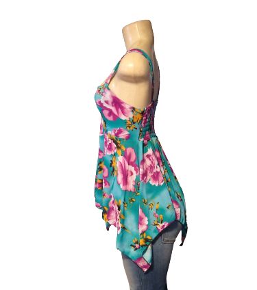 Take this top on vacation with you this year! It is a very cute baby doll blue top, material is soft to the touch and has a floral print to it in blue, purple, and yellow times. is true to size.Has lots of stretch! Would make a good pregnancy top. Material is 65% spandex and 35% polyester Floral Print Stretch Tops For Vacation, Stretch Printed Tops For Beach Season, Turquoise Floral Print Top For Spring, Fitted Floral Print Tank Top For Vacation, Printed Sleeveless Beachwear Top, Stretch Floral Print Top For Beach Season, Multicolor Stretch Beachwear Tops, Floral Print V-neck Beachwear Top, Turquoise Floral Print Tops For Beach