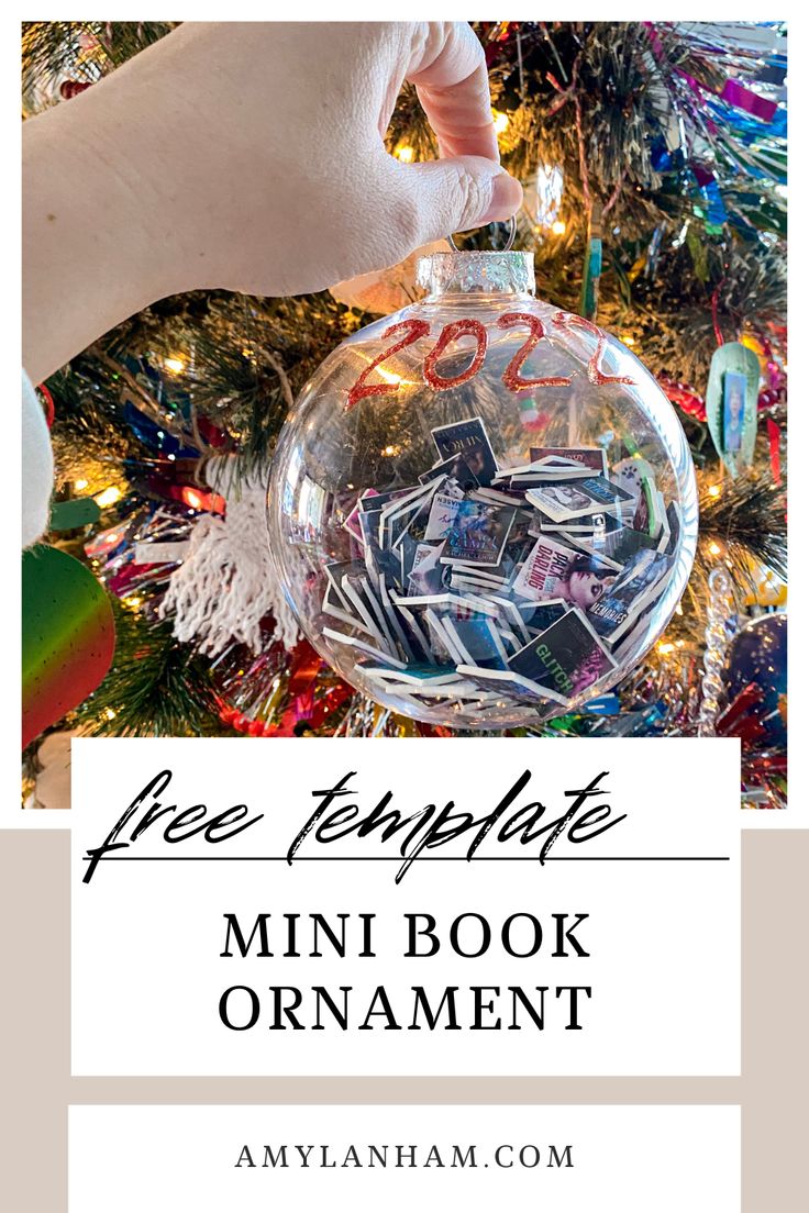 a hand holding a christmas ornament with the words free template for mini book ornaments