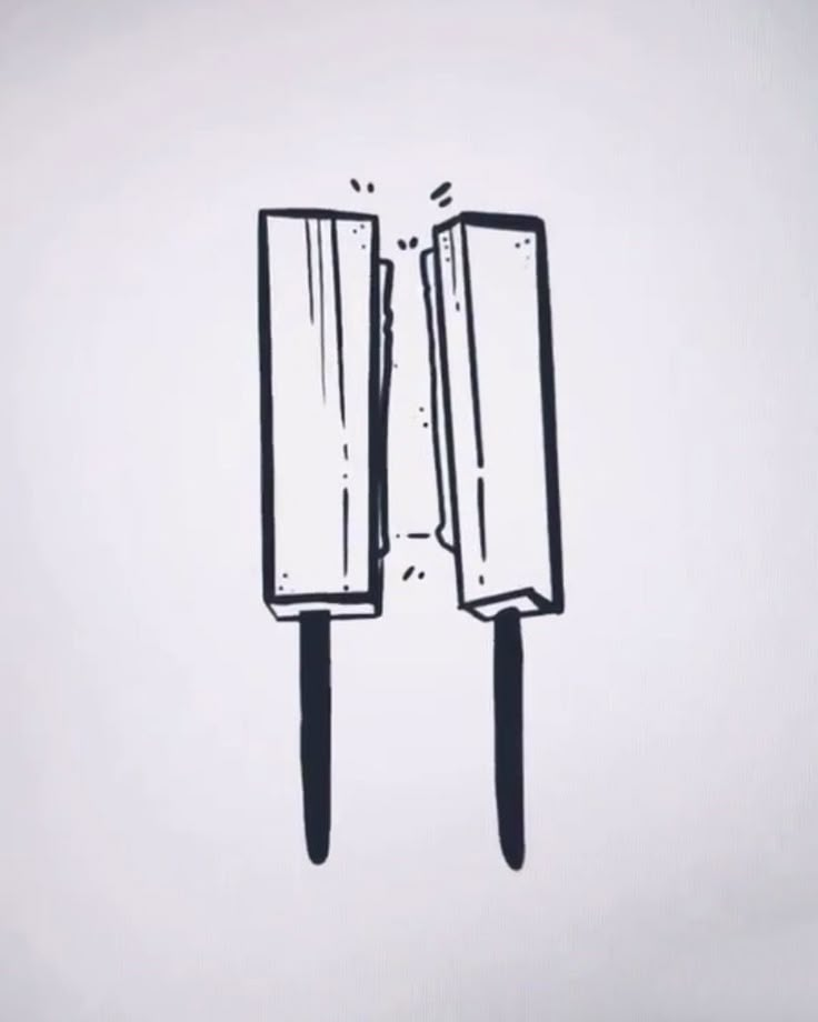 two toothbrushes sticking out of each other on a white surface with black ink