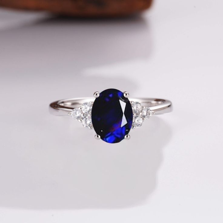 We’re determined that our customers deserve the best – and as such, here at Kherish, we’ve put our all into developing our gorgeous collection of handmade jewelries. One such product is our breathtaking Tya Sapphire ring, whose 1.0 carat center gemstone and natural crystal ring give it undeniable magic and appeal. ✦ DETAILS ✦ ✧ Handcrafted ✧ 1.0 Carat center stone ✧ Sizes 2.75-15.25 US ✧ Sterling silver ring ✧ This ring will arrive ready to gift in a Kherish velvet box. ✧ Due to the nature of th Timeless Sapphire Ring Gift, Timeless Sapphire Ring With Center Stone As Gift, Oval Lab-created Sapphire Diamond Ring For Wedding, Timeless Lab-created Sapphire Promise Ring, Timeless Diamond Ring With Accent Stones For Gift, Timeless Diamond Ring With Accent Stones As A Gift, Timeless Jewelry With Lab-created Sapphire For Gift, Timeless Lab-created Sapphire Jewelry Gift, Oval Lab-created Sapphire Jewelry For Wedding