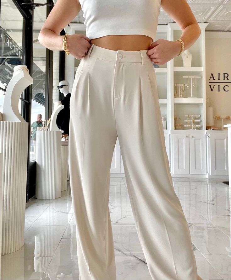 The everyday, high-rise, and wide leg trouser you have been searching for. These trousers can be dressed up or down making them casually chic or the perfect addition to your work wardrobe. They are sleek, yet, flowy and are the ideal choice to elevate your look. Pair the trousers with the Medici button downs or sable and coconut tops for a bold chic look!! Airotciv by Victoria Designs extra small small - length 38in, waist 28in, hip 37in medium - length 38in, waist 30in, hip 41in large - length Casually Chic, Montce Swim, Only Hearts, Stacked Necklaces, Dress Hairstyles, Elevate Your Look, Work Wardrobe, Small Designs, Hat Hairstyles