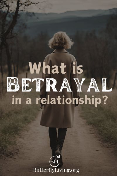 a woman walking down a dirt road with the words, what is betraval in a