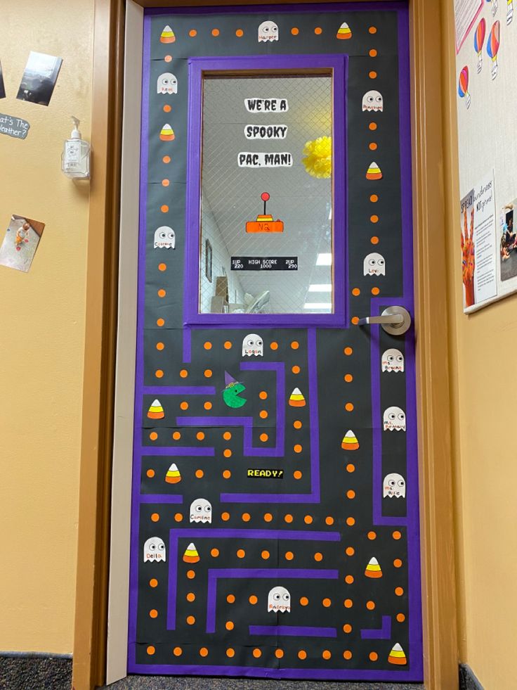 a door decorated to look like a pacman game