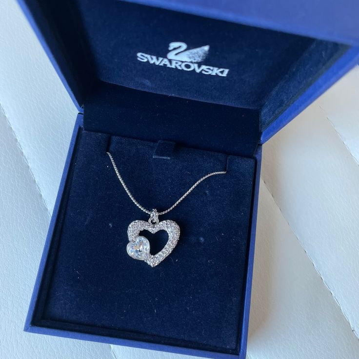 Features One Small Heart And One Large 16 Inch Chain, Can Adjust For Length Because Of Clasp! (See Second Photo) Perfect Condition! Never Worn Comes In Original Box Swarovski Heart Necklace, Swarovski Heart, Jewelry Swarovski, Swarovski Necklace, Enamel Necklaces, Swarovski Jewelry, Small Heart, Diamond Pendant, Cross Pendant