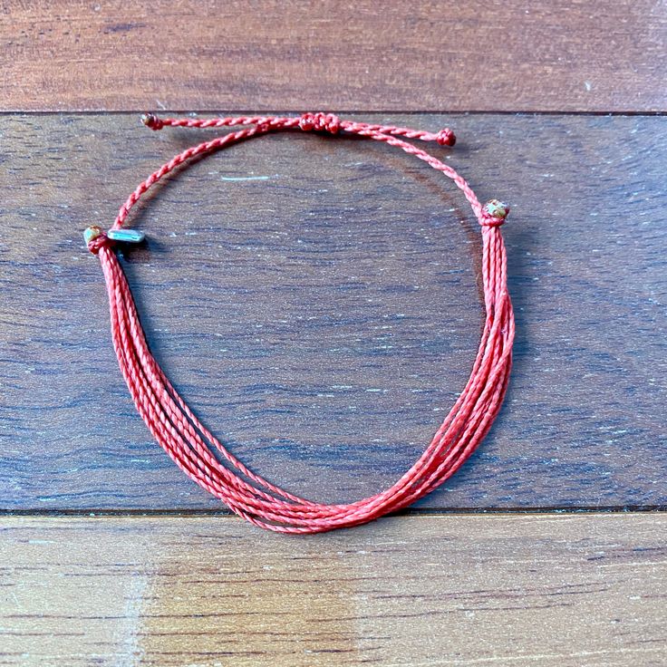 "The Heart Disease Awareness Bracelet is made from twisted waxed polyester thread which is water-resistant material. It is sturdier than other bracelet materials and features an adjustable closure. The Heart Disease Awareness bracelet is made in the same colors as the Heart Disease awareness ribbon of red and has a silver heart attached.  Available in two different sizes: The adult size is adjustable from approximately 6\" - 9.5\" inches. The child/toddler size is adjustable from approximately 4 Heart Diseases, In Remembrance Of Me, Surfer Bracelets, Awareness Bracelet, Awareness Ribbon, Awareness Ribbons, Braided Bracelets, Heart Bracelet, Silver Heart