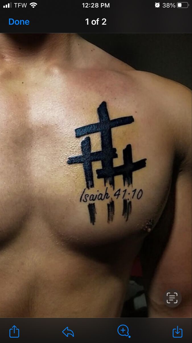 a man's chest with a cross and the words jesus 4 10 on it