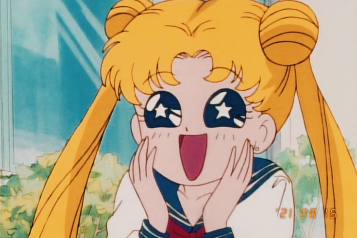 an anime character with blue eyes and long blonde hair, making a funny face while looking at the camera