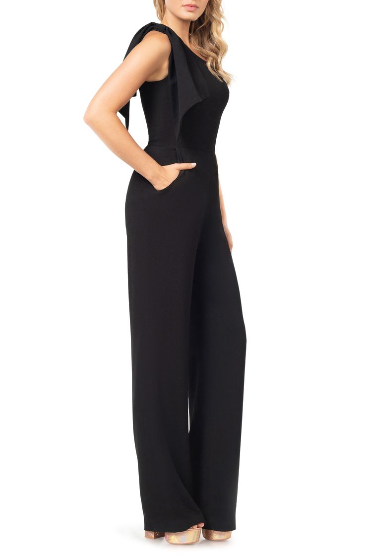 An elegant one-shoulder neckline and figure-skimming silhouette style a sophisticated jumpsuit with two panels that cascade over the single shoulder. 63 1/2" length; 34" inseam; 22 1/2" leg opening (size Medium) One-shoulder neck Sleeveless Lined 97% polyester, 3% spandex Dry clean Imported Elegant Black Jumpsuits And Rompers For Gala, Elegant Full-length Strapless Jumpsuit For Party, Elegant Solid Strapless Jumpsuit For Evening, Strapless Jumpsuit For Evening, Elegant Full-length Solid Jumpsuits And Rompers, Elegant Full Length Solid Color Jumpsuit, Elegant Strapless Jumpsuit For Night Out, Chic Strapless Jumpsuit For Evening, One-shoulder Jumpsuits And Rompers For Evening