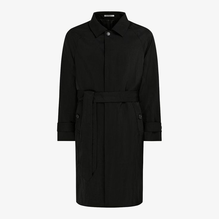 Beat the weather in style with this black belted trench coat. Comfortably tailored and water-repellent, this knee-length later features a broad collar, spacious welted pockets and detachable self-fabric belt. Modern Black Outerwear With Belted Cuffs, Classic Business Outerwear With Belted Cuffs, Fitted Black Outerwear For Travel, Black Belted Business Outerwear, Black Spring Outerwear With Concealed Placket, Black Outerwear With Concealed Placket For Spring, Business Long Coat With Belted Cuffs, Black Belted Formal Outerwear, Black Belted Outerwear For Business