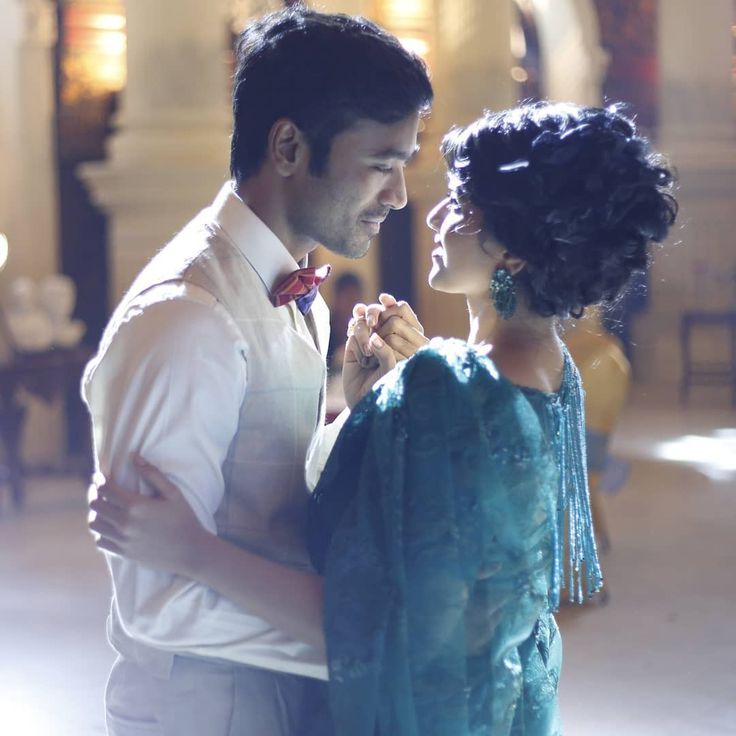 a man and woman dancing together in the middle of a dance floor with text that reads,