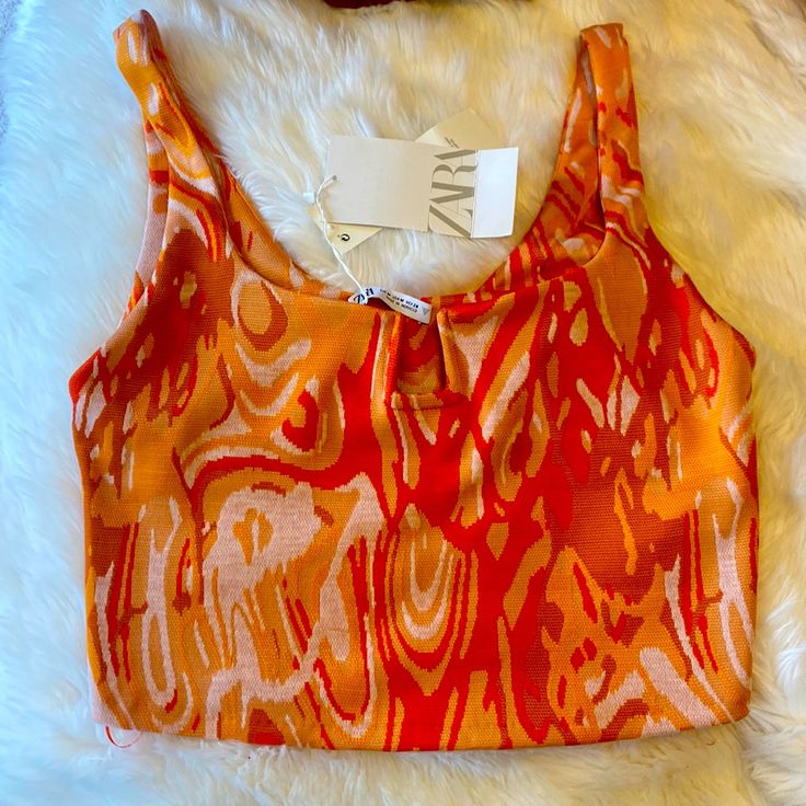 Zara Orange Tank. Brand New Spring Party Printed Tank Top, Summer Printed Crop Top Tank, Chic Printed Summer Crop Top, Printed Crop Top Tank For Spring, Summer Day Out Printed Crop Top, Printed Crop Top For Spring Party, Chic Printed Tank Top For Summer, White Floral Print Tank Top For Party, Orange Summer Crop Tank Top