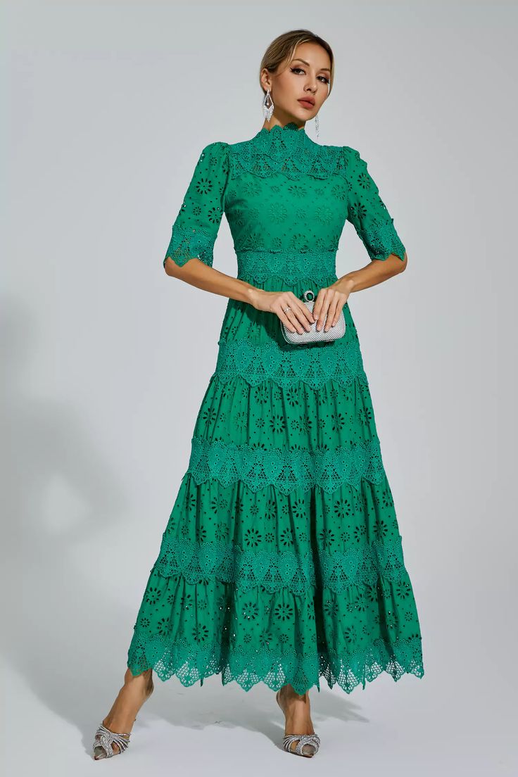 Enhance your elegance with the Kenna Green Hollow Half Sleeve Midi Dress. This exquisite dress showcases a stunning embroidered hollow design, adding a touch of sophistication to your look. Its half sleeves and midi length create a flattering silhouette, while the waistline accentuates your curves.   Dress Length: Approx 123cm Materials: Polyester Gentle Dry Clean Only  Model is 5 ft 74 and wears size S  Colour may vary due to lighting on images. The product images (without model) are closest to Dresses Event, Glitter Wedding Dress, Bandage Midi Dress, Floral Shirt Dress, Puff Sleeve Dresses, Hollow Design, Green Midi Dress, Maxi Knit Dress, Midi Dress With Sleeves