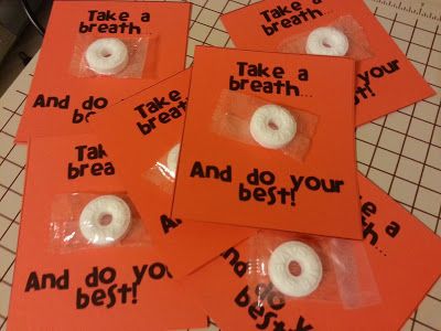 six orange tags with donuts on them saying take a breath and do your best