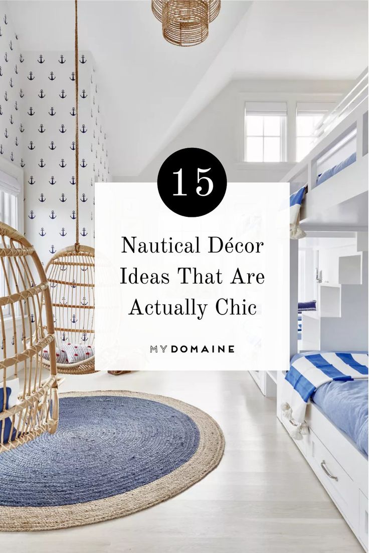 a bedroom with bunk beds and blue rugs on the floor in front of it