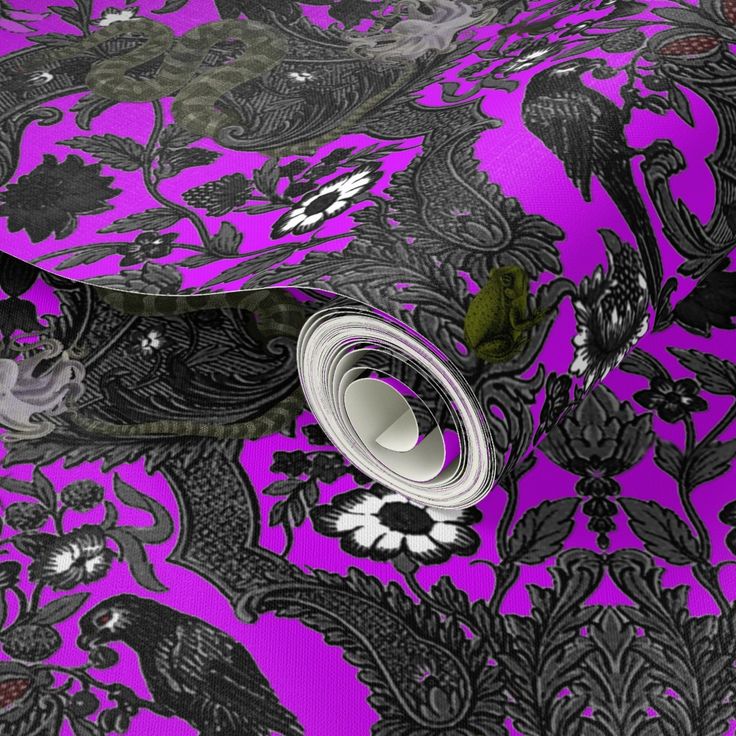 purple and black wallpaper with floral designs on it