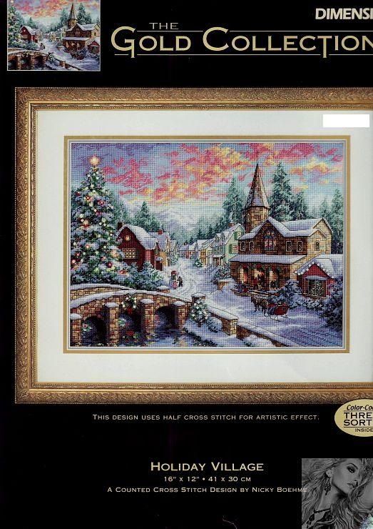 a cross stitch christmas scene with the words holiday village on it's front cover