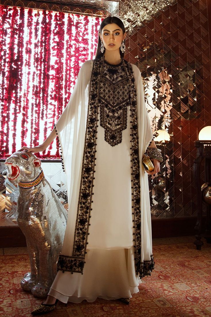 Eid Georgette Unstitched Kaftan, Eid Dabka Embellished Georgette Kaftan, Eid Dabka Embroidered Georgette Kaftan, Eid Unstitched Georgette Kaftan, Designer Anarkali White Kaftan, White Traditional Drape Palazzo Set With Dabka, White Dabka Palazzo Set With Traditional Drape, Festive White Kaftan With Dupatta, Formal Eid Abaya With Dabka Work