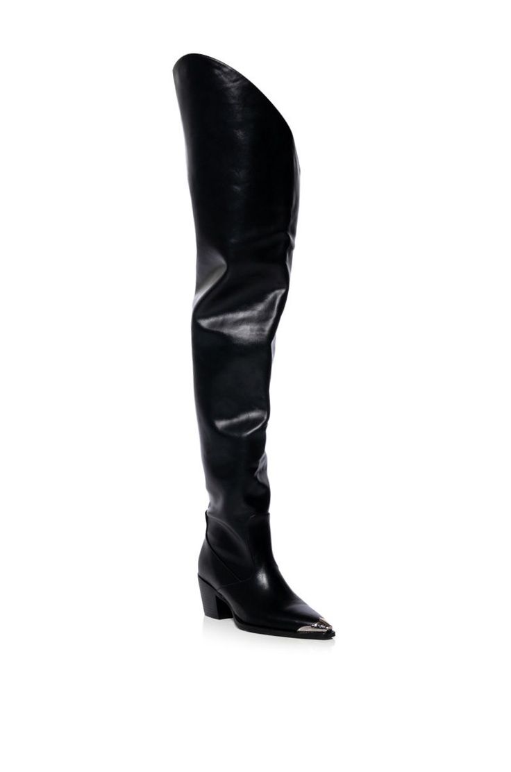 What’s not to love about these cowboy boots? The Ria Thigh High Western Boot In Black is made from a soft faux leather upper and features a pointed toe silhouette with a metal tip, a rounded, thigh high shaft, and a pull-on fit. Complete with a chunky heel and an angled cut at the top of the boot. Faux leather upper Pointed toe Chunky heel 30.5” shaft height 2.5” heel height Leather Thigh High Boots, Black Thigh High, Entrepreneur Fashion, Azalea Wang, Western Boot, Thigh High Boots, Chunky Heel, Thigh High, Western Boots