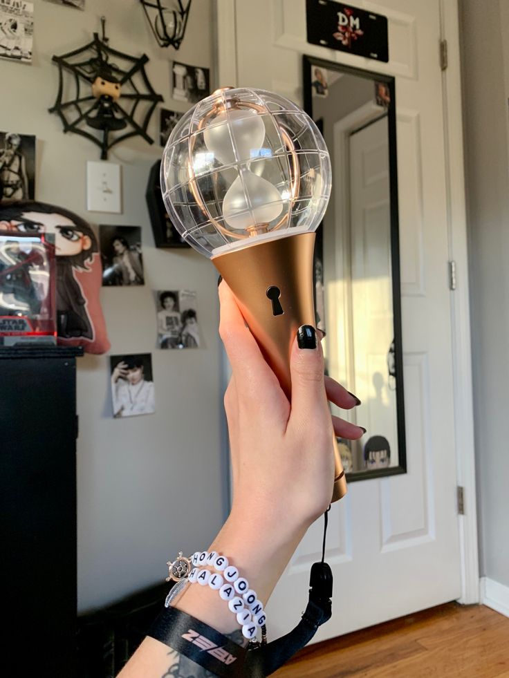 a woman holding a hair dryer in her hand