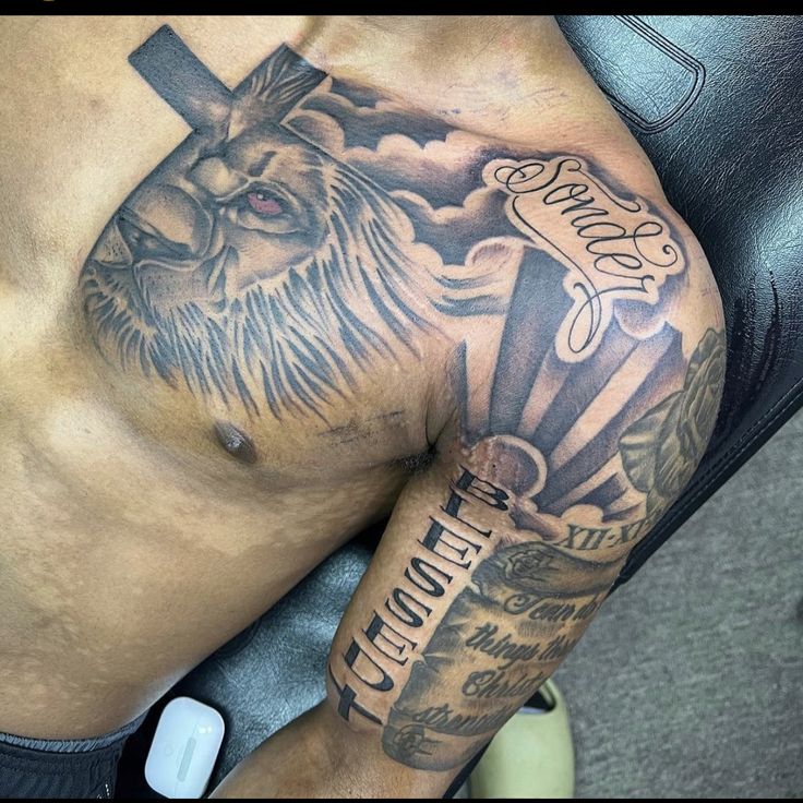 a man with a cross tattoo on his arm