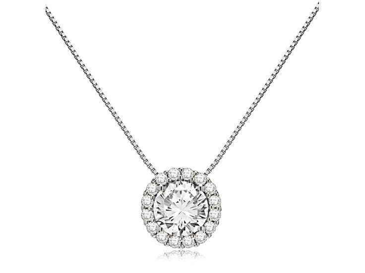 This divine pendant boasts a brilliant Round cut 6.5 mm (1.0 carat) Cubic Zirconia stone (CZ). Creating a halo around the main stone are 16 more 1.5 mm CZs for a total diamond equivalent of 1.24 carats . Our top-grade AAAAA CZ look just like a real diamond that would cost thousands of dollars. Professionally mounted in a heavy basket setting, this radiant pendant dangles from a 16-inch box link chain with a springring clasp. All are crafted in solid 14K White or Yellow Gold, with no other metals Cubic Zirconia Necklaces With Prong Setting In Round Shape, White Gold Necklaces With Center Stone For Anniversary, White Gold Necklace With Center Round Stone, Dazzling Necklace With Center Stone As Gift, White Gold Necklace With Center Stone For Gift, Dazzling Necklace With Center Stone For Gift, White Gold Necklace With Center Stone, Anniversary Cubic Zirconia Necklace With Center Stone, Gift Diamond Necklace With Round Cut Center Stone